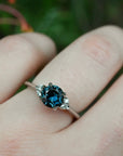 ‘Pia’ 1.19ct Teal Blue Australian Sapphire & Diamond Platinum Ring on hand