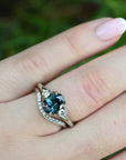 ‘Tempest Trilogy’ 1.53ct Teal Australian Sapphire & Diamond Platinum Ring on hand