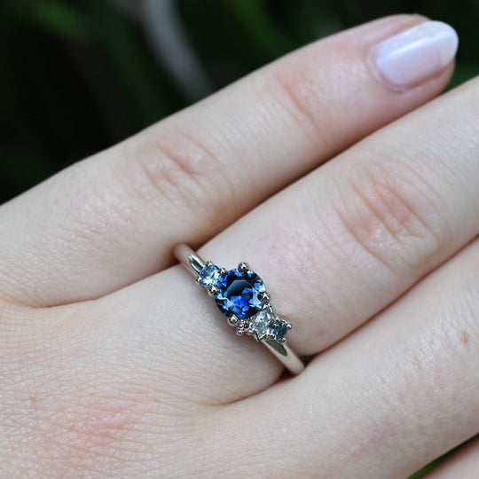 ‘Rockpool’ 0.68ct Australian Blue Sapphire & Diamond Platinum Ring on finger