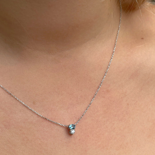 ‘Zoya’ Aquamarine & Diamond White Gold necklace & earrings wearing the necklace