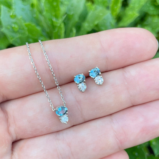 ‘Zoya’ Aquamarine & Diamond White Gold necklace & earrings on hand