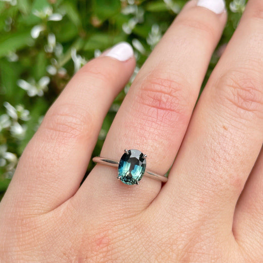 "HighWire" 1.69ct teal Australian sapphire and platinum ring on hand