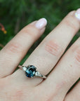 ‘Tempest Trilogy’ 1.53ct Teal Australian Sapphire & Diamond Platinum Ring on hand