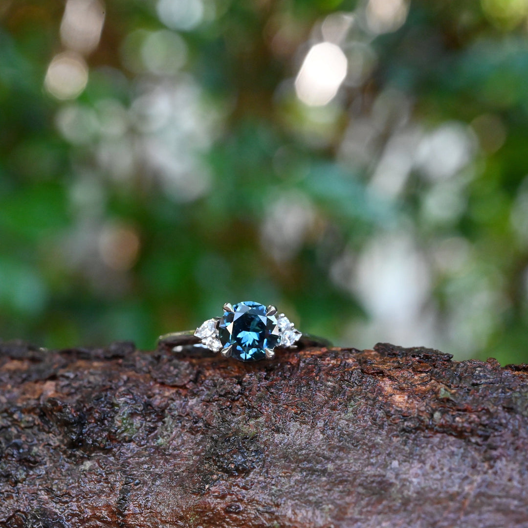 ‘Pia’ 1.19ct Teal Blue Australian Sapphire & Diamond Platinum Ring on branch