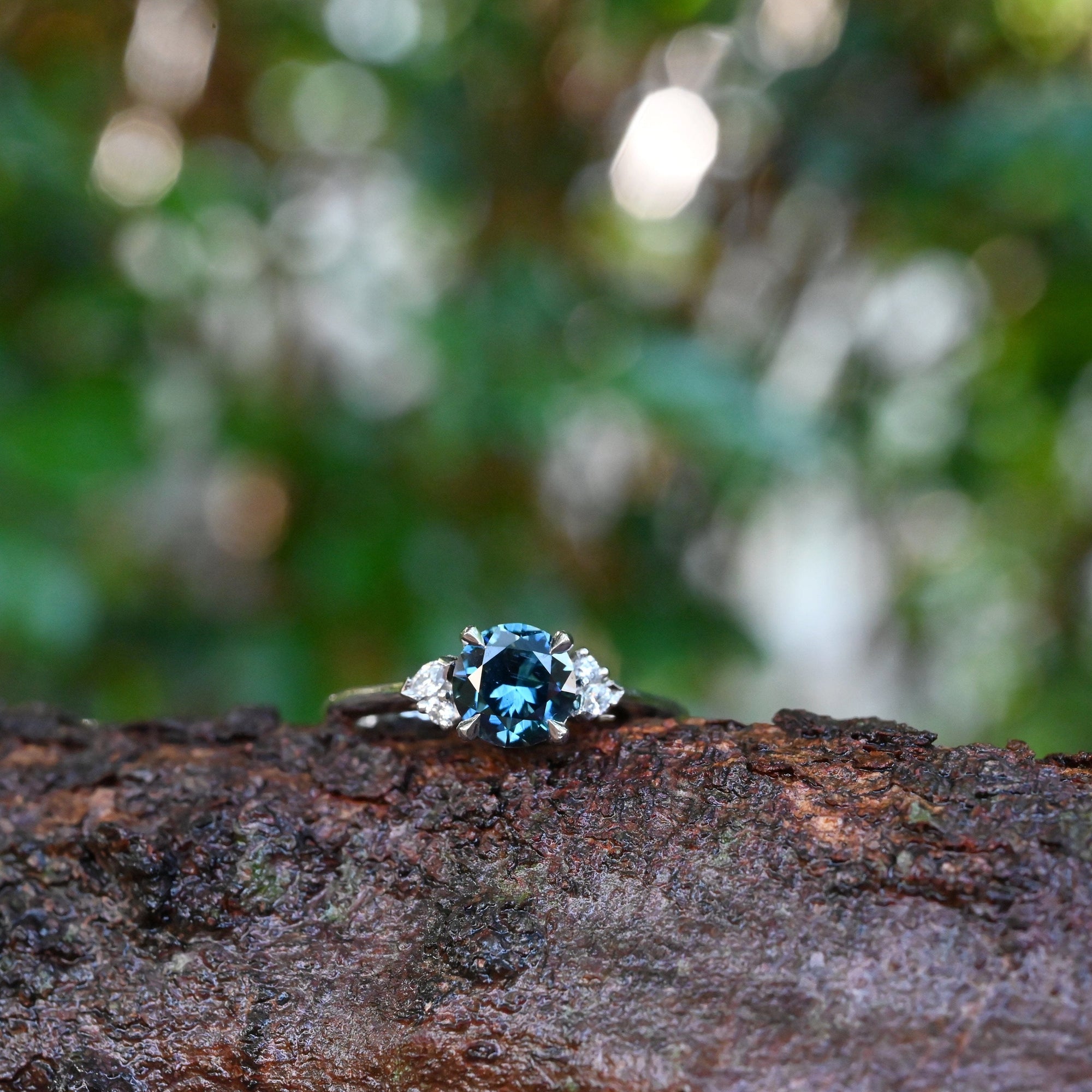 ‘Pia’ 1.19ct Teal Blue Australian Sapphire &amp; Diamond Platinum Ring on branch
