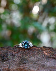 ‘Pia’ 1.19ct Teal Blue Australian Sapphire & Diamond Platinum Ring on branch