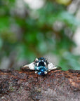 ‘Tempest Trilogy’ 1.53ct Teal Australian Sapphire & Diamond Platinum Ring on branch