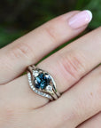 ‘Tempest Trilogy’ 1.53ct Teal Australian Sapphire & Diamond Platinum Ring wearing on hand