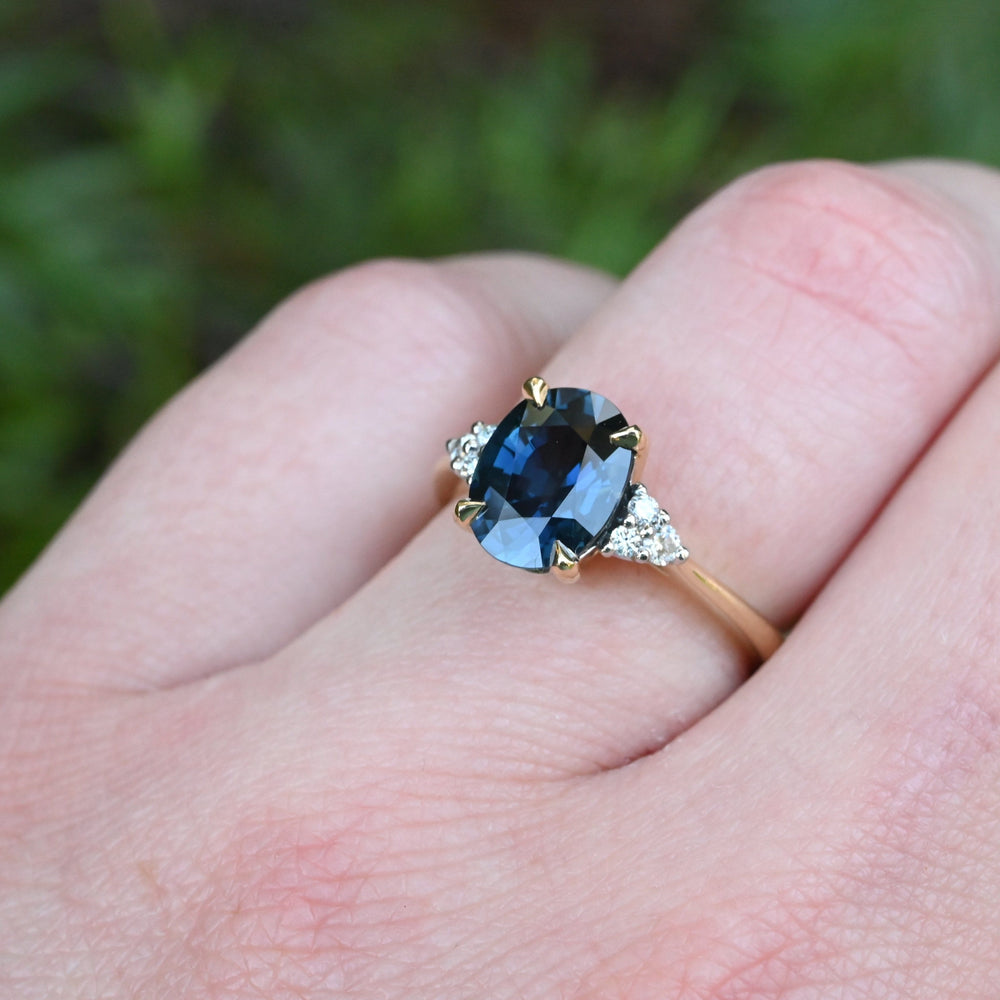 ‘MiMi’ 2.31ct Oval-cut Blue Australian Sapphire 18ct Yellow Gold Ring wearing on hand