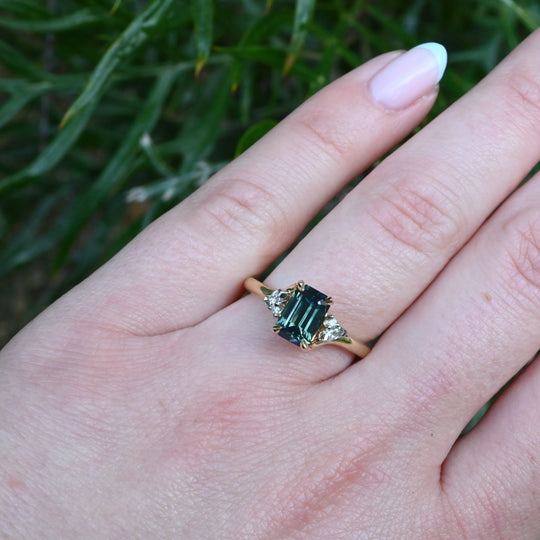 ‘Lily’ 1.51ct Green Australian Emerald-cut Sapphire & Diamond Ring wearing on hand