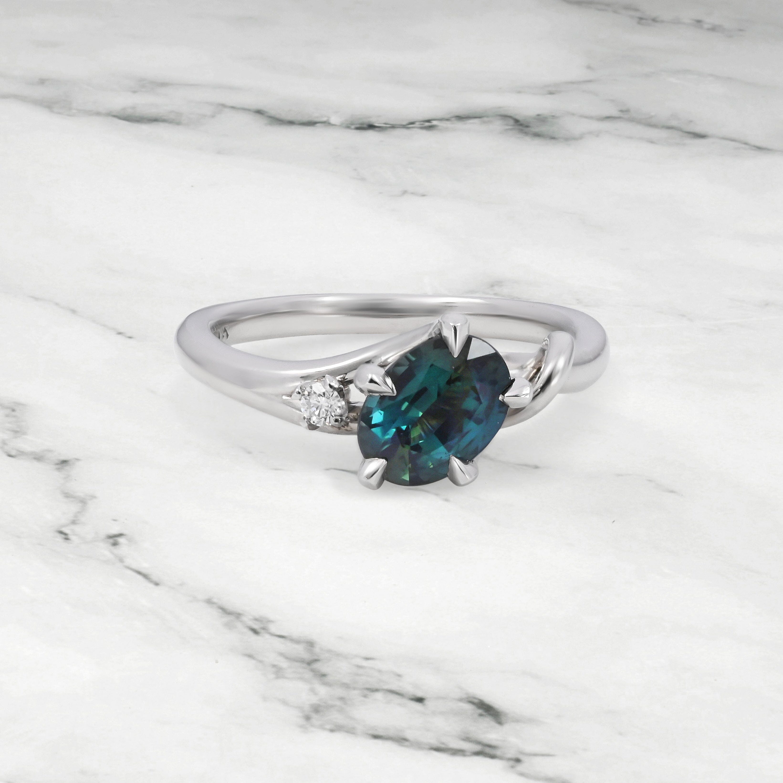 ‘Love Knot’ 1.02ct Oval-cut Teal Australian Sapphire Platinum Ring