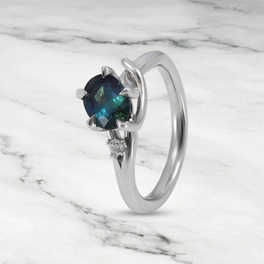 ‘Love Knot’ 1.02ct Oval-cut Teal Australian Sapphire Platinum Ring