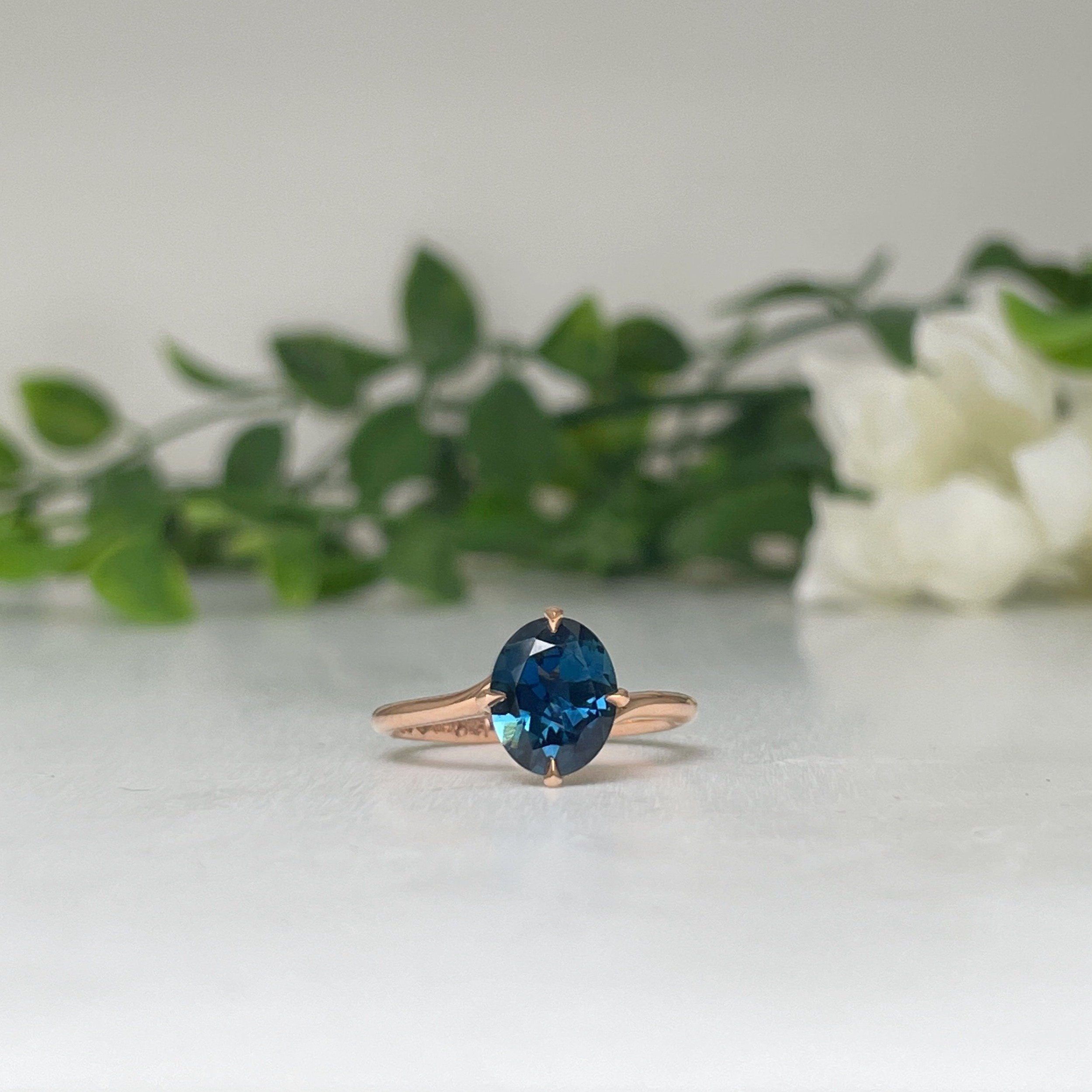 Rose gold store blue ring