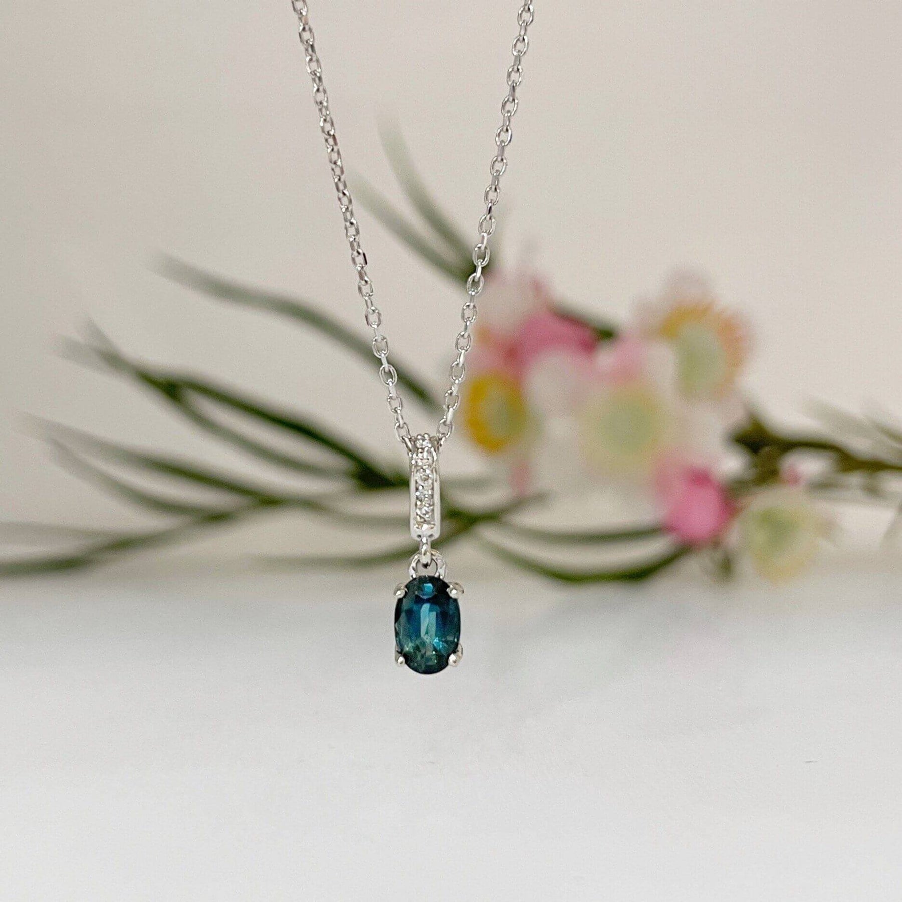Sterling Silver Oval Shape Created Teal Sapphire CZ Halo Necklace