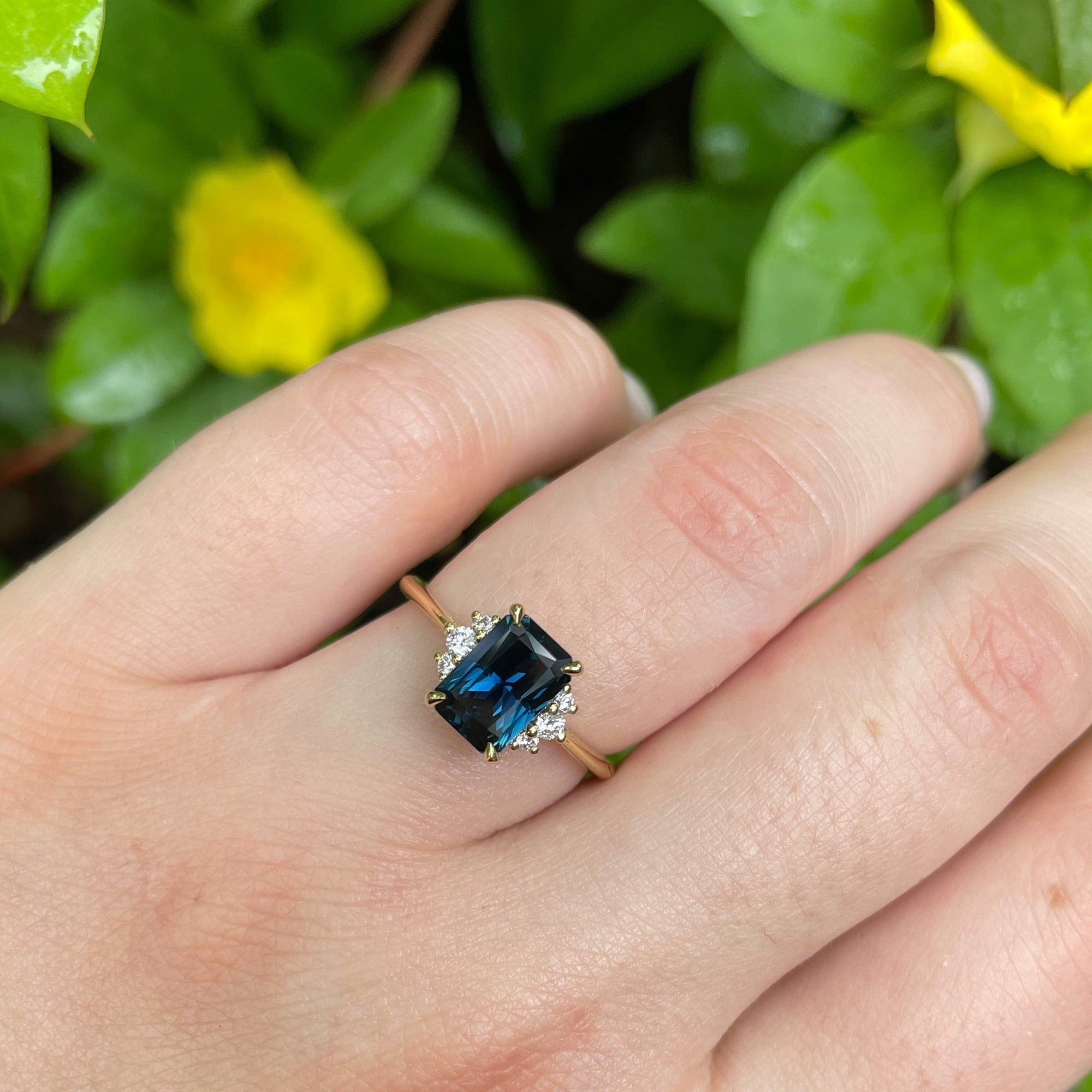 ‘Zoe’ 1.72ct Teal Radiant-Cut Australian Sapphire Ring on hand