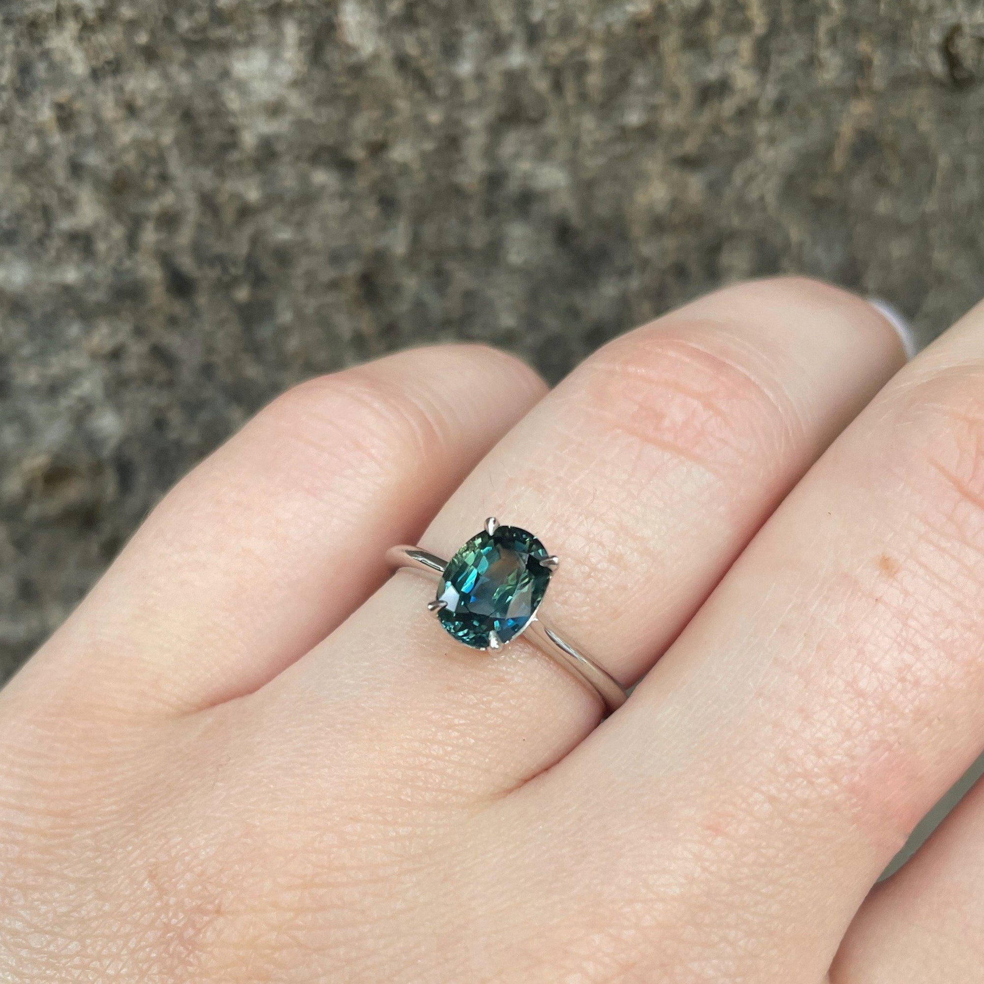 on hand "HighWire" 1.69ct teal Australian sapphire and platinum ring